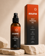 Asuno Self Tanning Oil bottle and carton on pale stone — gradual sunless tan, 100 ml / 3.3 fl oz