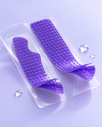 Two violet V34 strips peeling away from their clear backing film